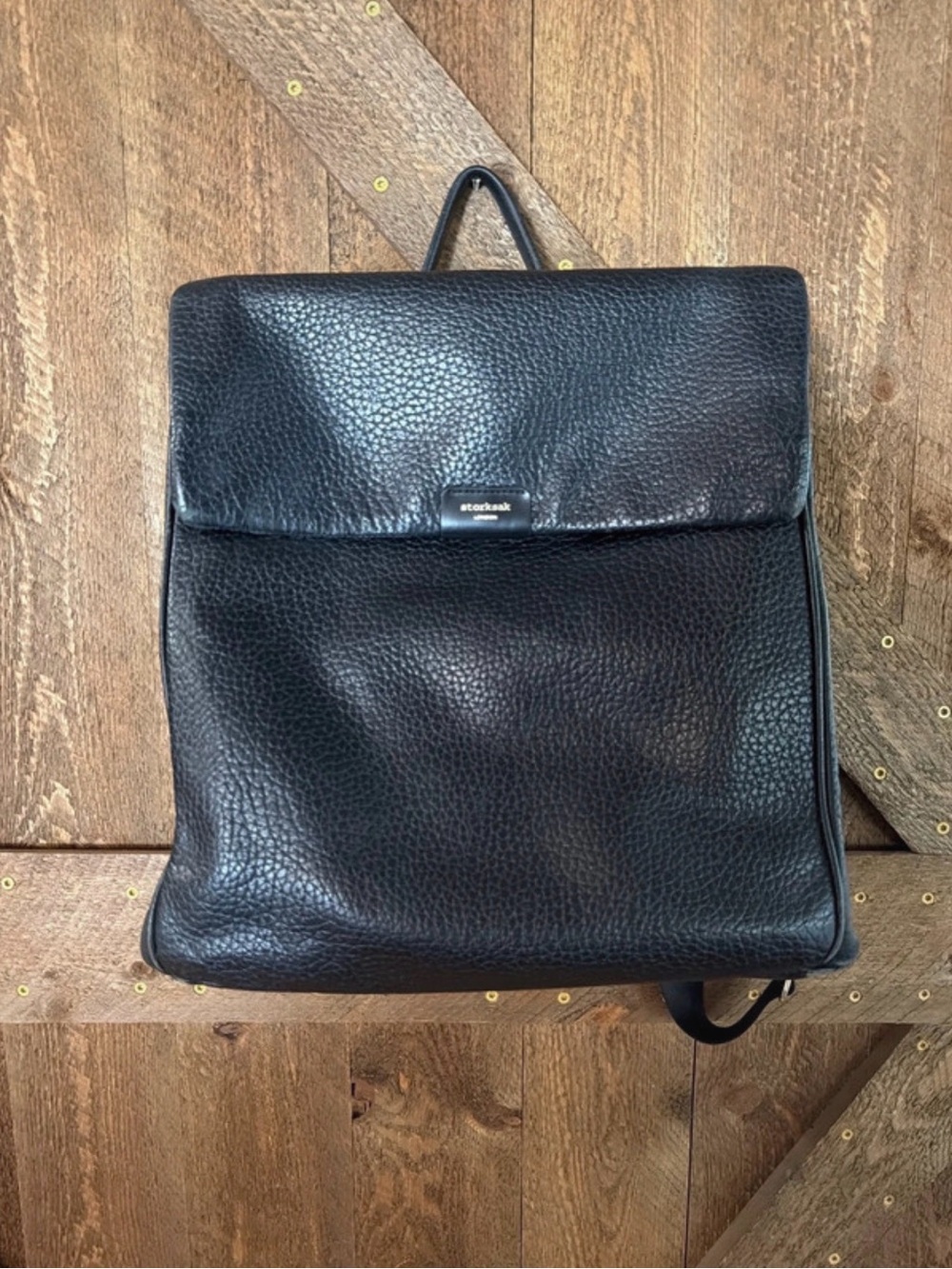 Storksak Black Pebbled Leather Backpack